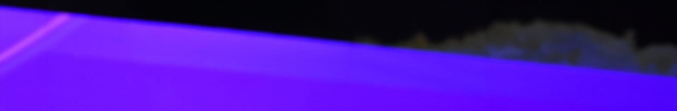 Stage floor washed in violet light